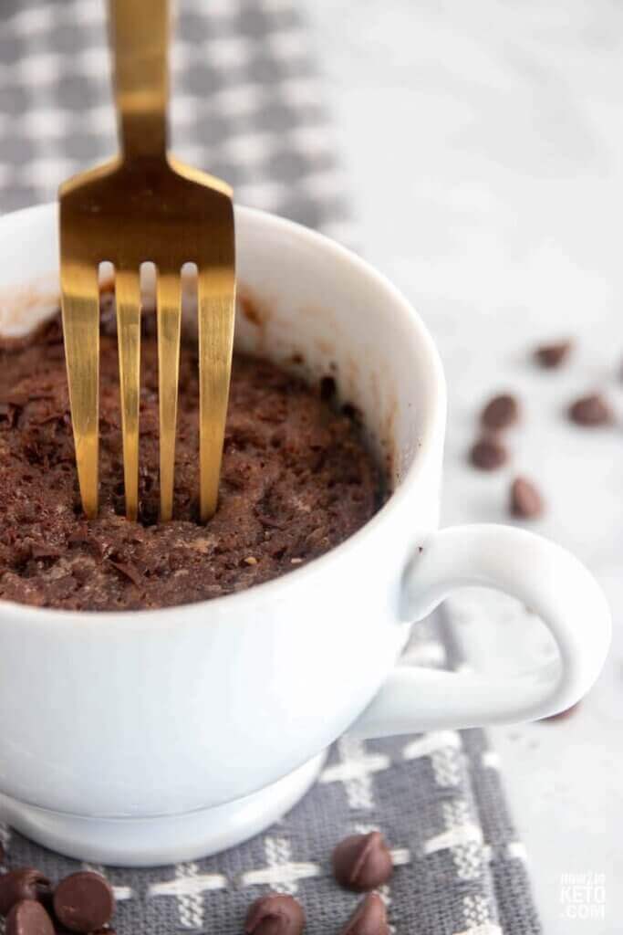 mug cake with fork about to take a bite