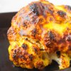Who says cauliflower has to be boring?! Keto Spicy Roasted Cauliflower is unlike any cauliflower recipe you've ever tasted before: tender baked cauliflower with a crispy, tangy coating and just the right amount of spice!