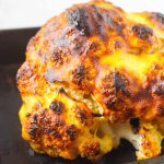 Who says cauliflower has to be boring?! Keto Spicy Roasted Cauliflower is unlike any cauliflower recipe you've ever tasted before: tender baked cauliflower with a crispy, tangy coating and just the right amount of spice!