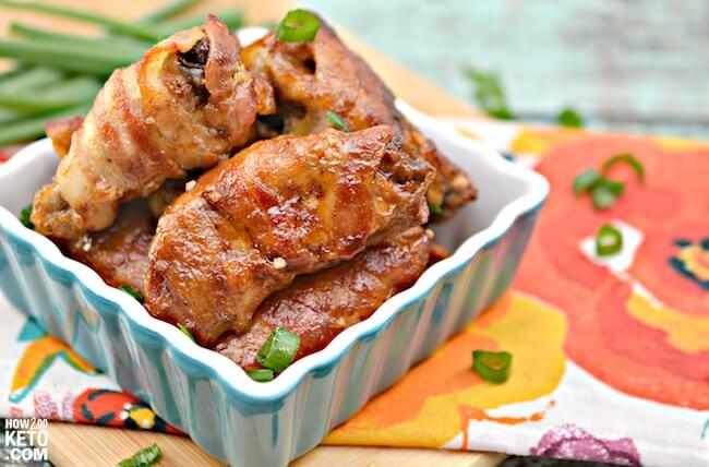 Everything is better with bacon, right?! Bacon Wrapped Keto Chicken Wings are packed with protein and flavor! The ultimate keto appetizer recipe! 
