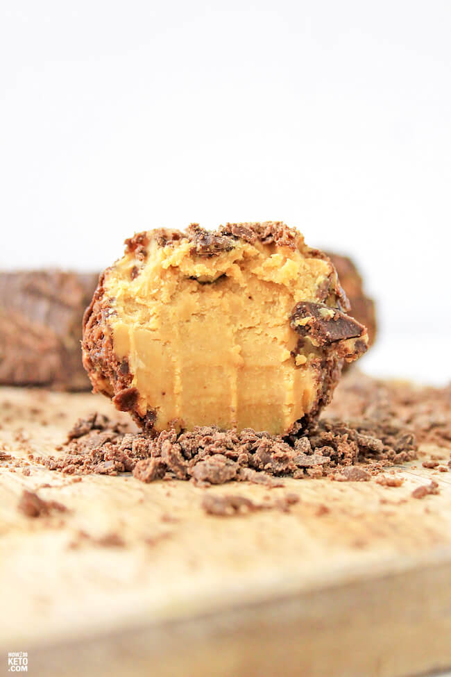 low carb chocolate peanut butter fat bomb with a bite missing