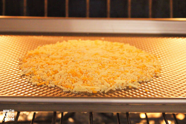 baking cheese taco shells on pan in oven