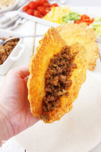 cheese taco shell filled with ground beef