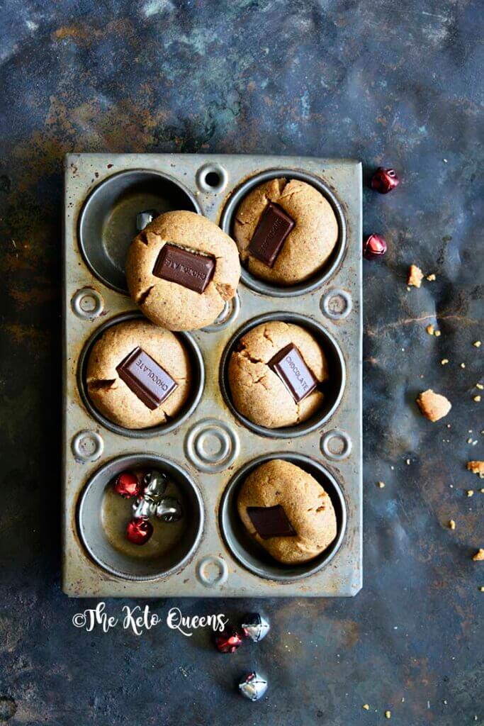 thick almond butter cookies with sugar free chocolate square in the middle