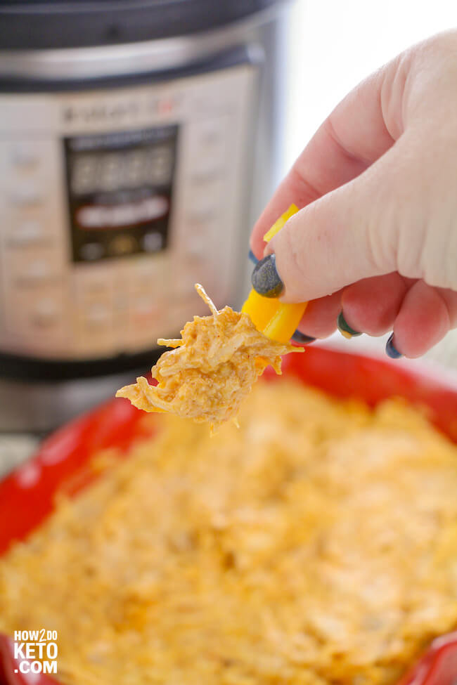 This quick and easy Instant Pot Chicken Enchilada Dip is the perfect keto-friendly game day dip!