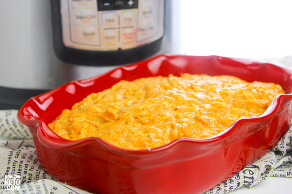 This quick and easy Instant Pot Chicken Enchilada Dip is the perfect keto-friendly game day dip and low carb Tex-Mex appetizer!