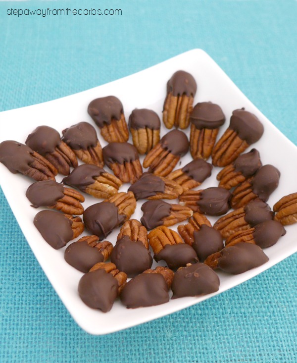 chocolate dipped pecans on plate