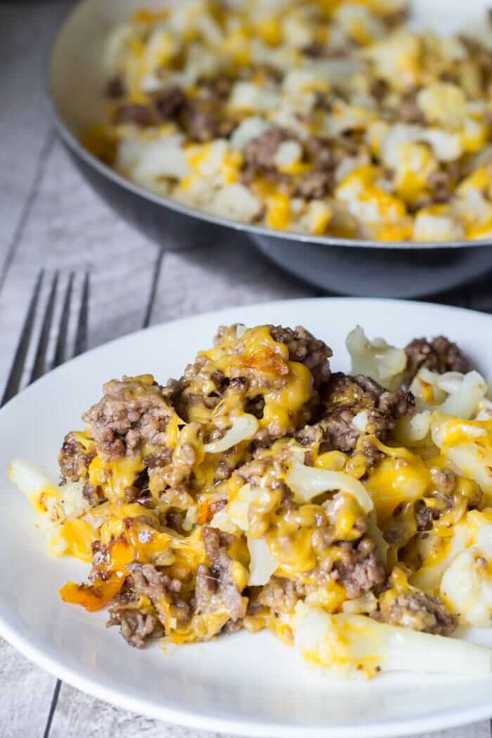 cauliflower ground beef has with melted cheese on top