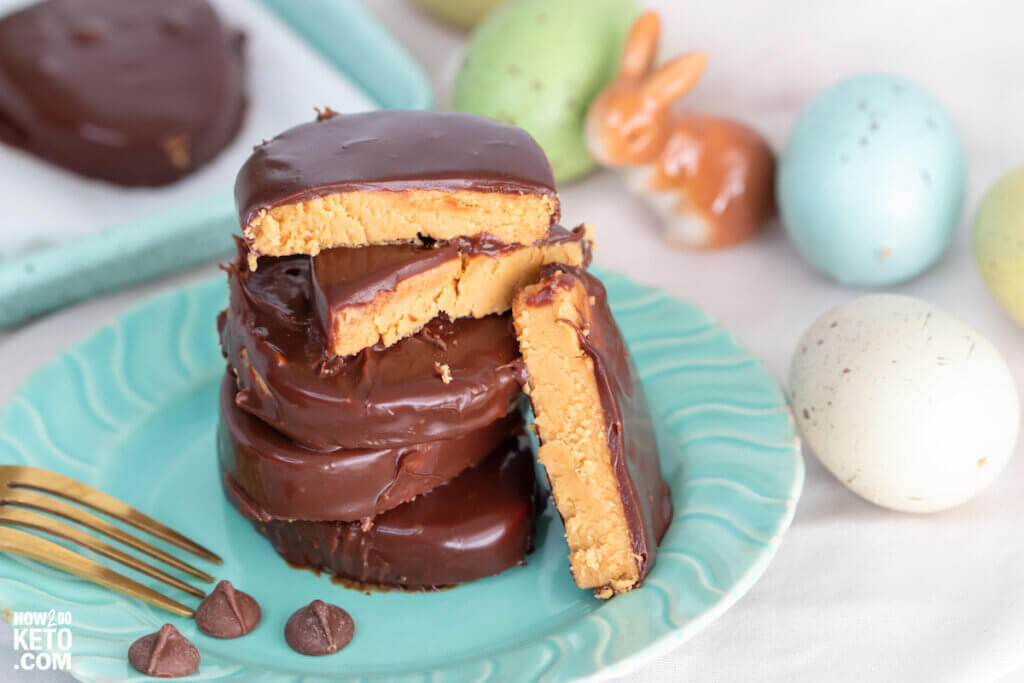 Love Reese's Peanut Butter Eggs? Sad that you can't eat them on the keto diet? Don't be!! We created a spot-on sugar free Reese's eggs copycat recipe that are downright amazing!! Even better, each one of these decadent Keto Peanut Butter Eggs is only 4g net carbs!