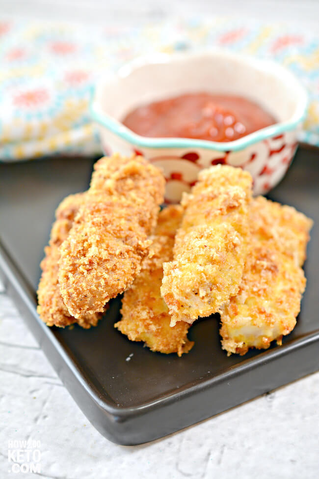 crispy keto air fryer fish sticks on plate with cocktail sauce