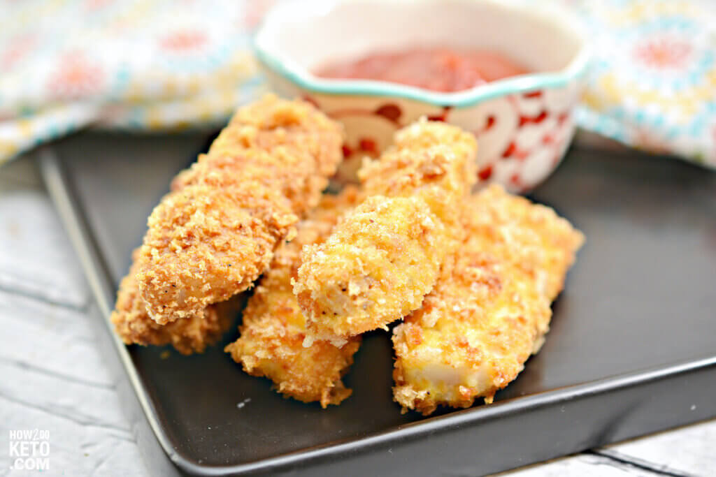 keto fish sticks on plate with dipping sauce