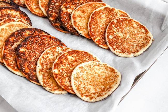 freshly cooked low carb pancakes on baking sheet