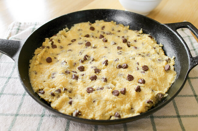 keto chocolate chip cookie dough batter in cast iron skillet
