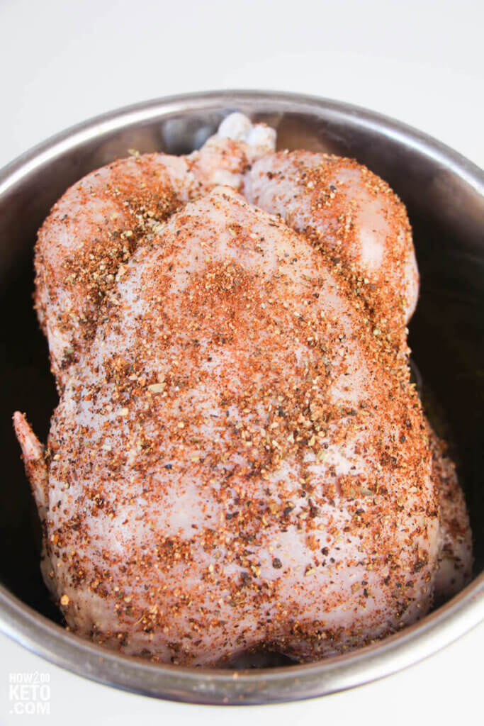 seasoned whole chicken in an Instant Pot