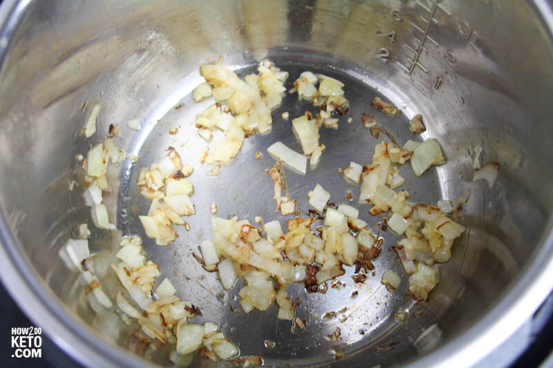 sautéing onions and garlic in an Instant Pot