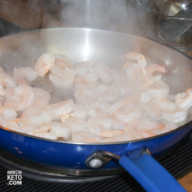 shrimp cooking in a sauté pan