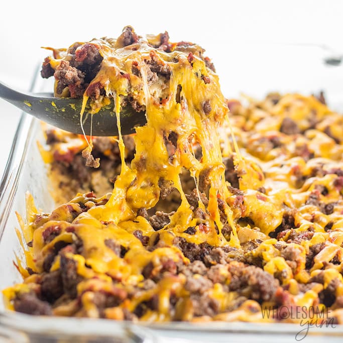 scooping cheesy ground beef casserole, cheese stretching