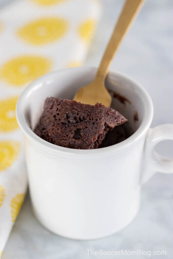 scooping out a bite of chocolate mug cake