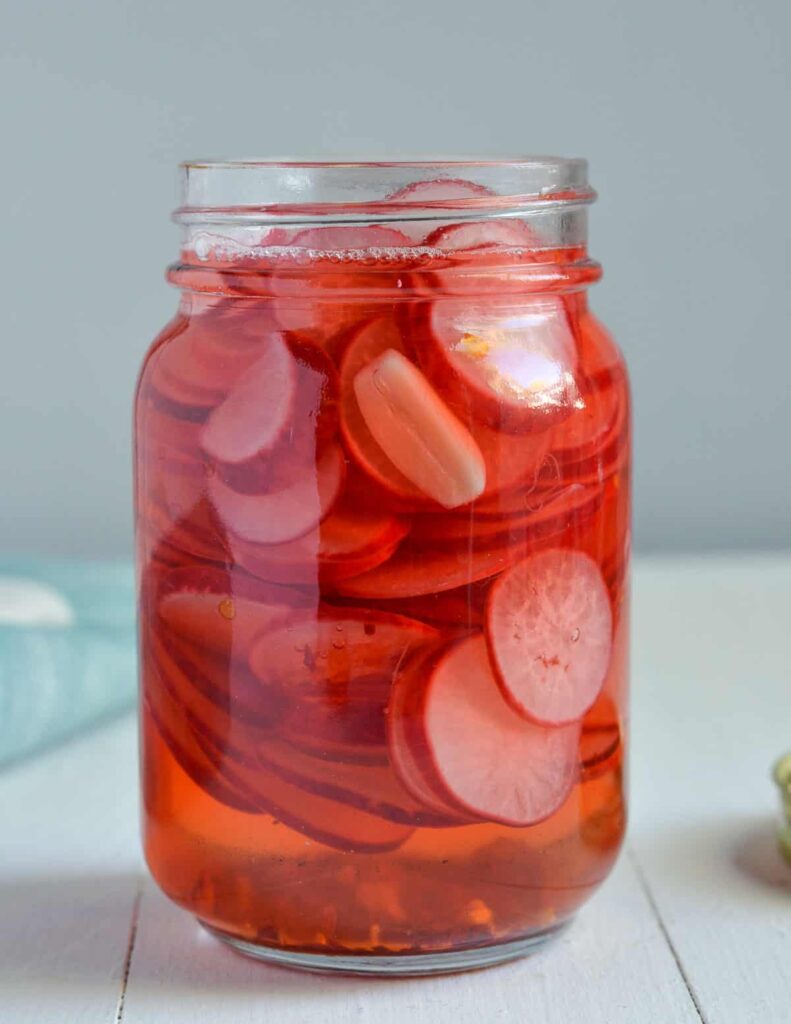 pickled radishes in mason jar