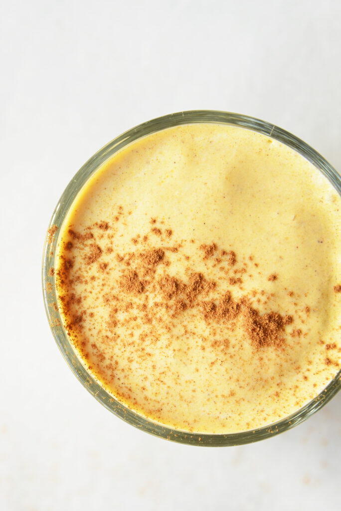 keto pumpkin smoothie topped with cinnamon