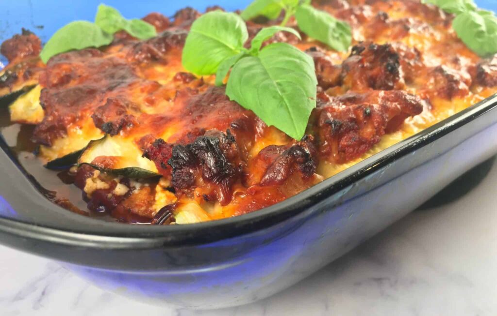 zucchini lasagna topped with fresh basil