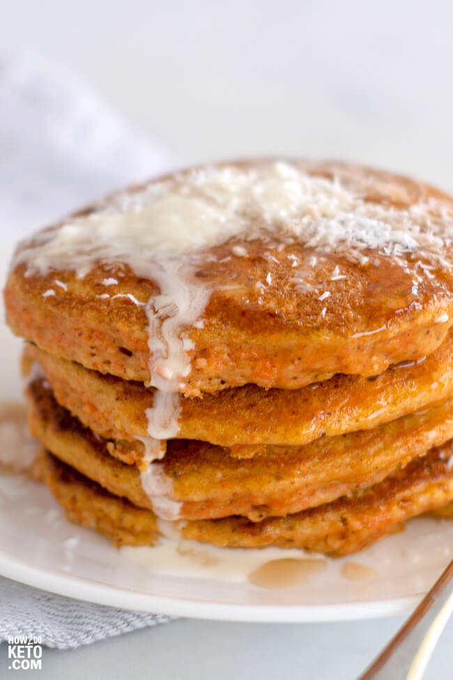 stack of carrot pancakes with melted butter