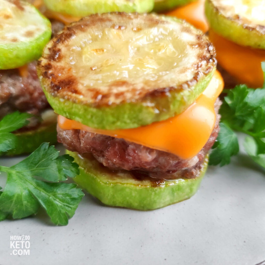 Close up of a keto slider made with zucchini for buns