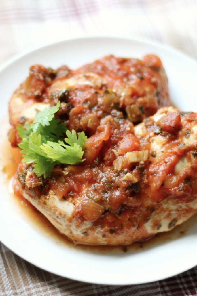 baked chicken topped with salsa
