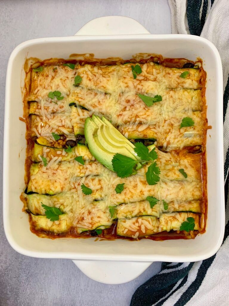 casserole dish with zucchini enchiladas