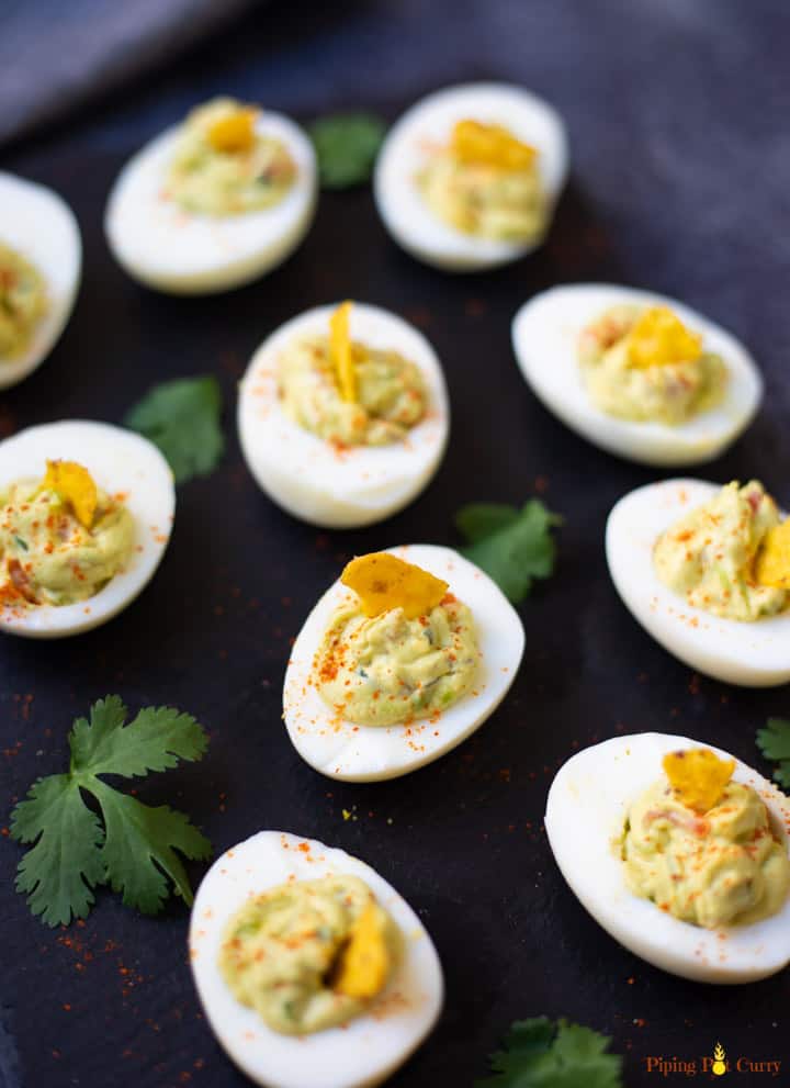 deviled eggs filled with guacamole