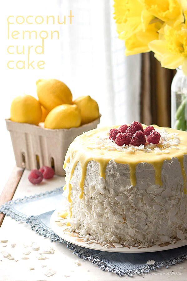 layer cake with coconut frosting and lemon curd