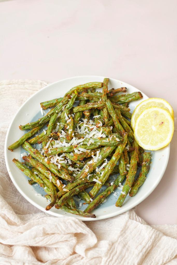 crispy green beans topped with grated parmesan