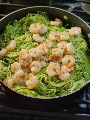shrimp with zoodles in pan