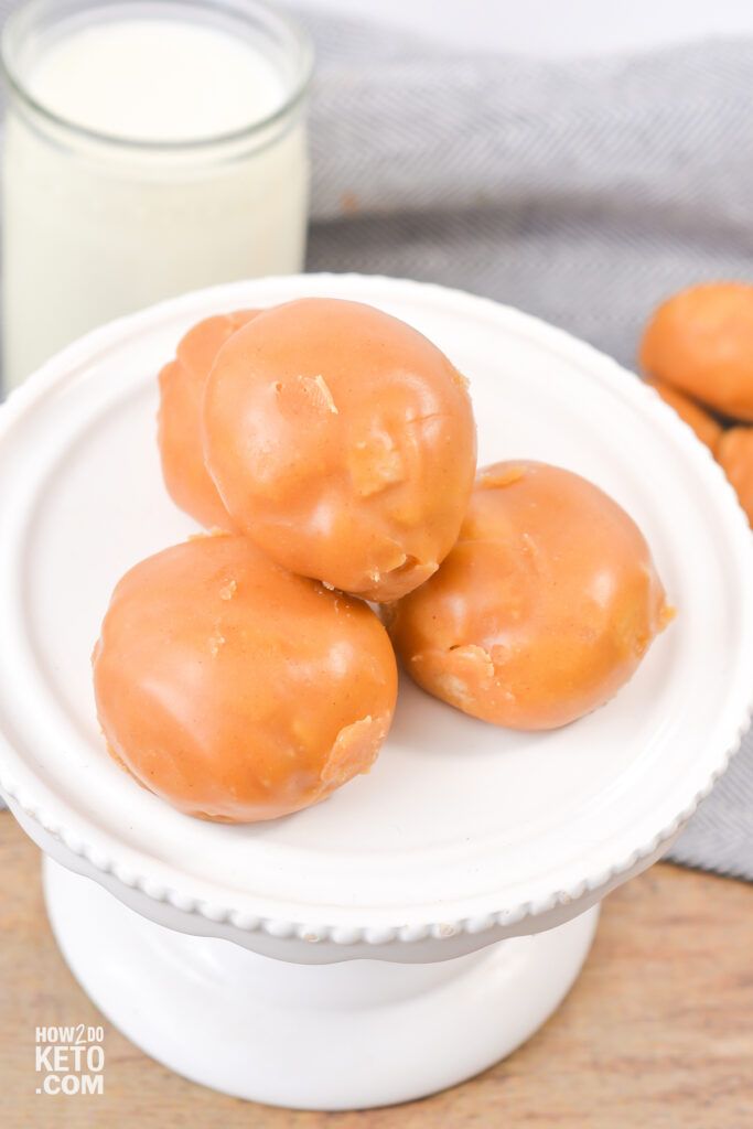 A small pile of Four Keto Peanut Butter Donut Holes