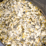 spinach artichoke dip in a slow cooker