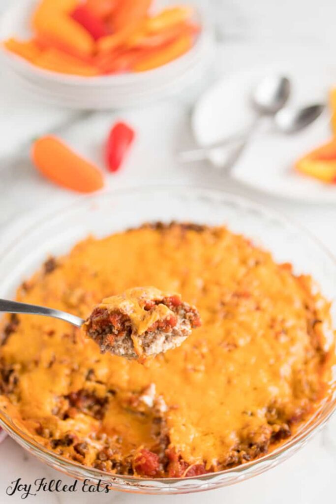 spoonful of a meaty and cheesy taco dip